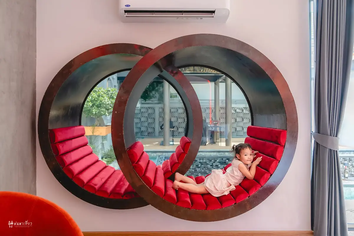 Two red porthole window seats